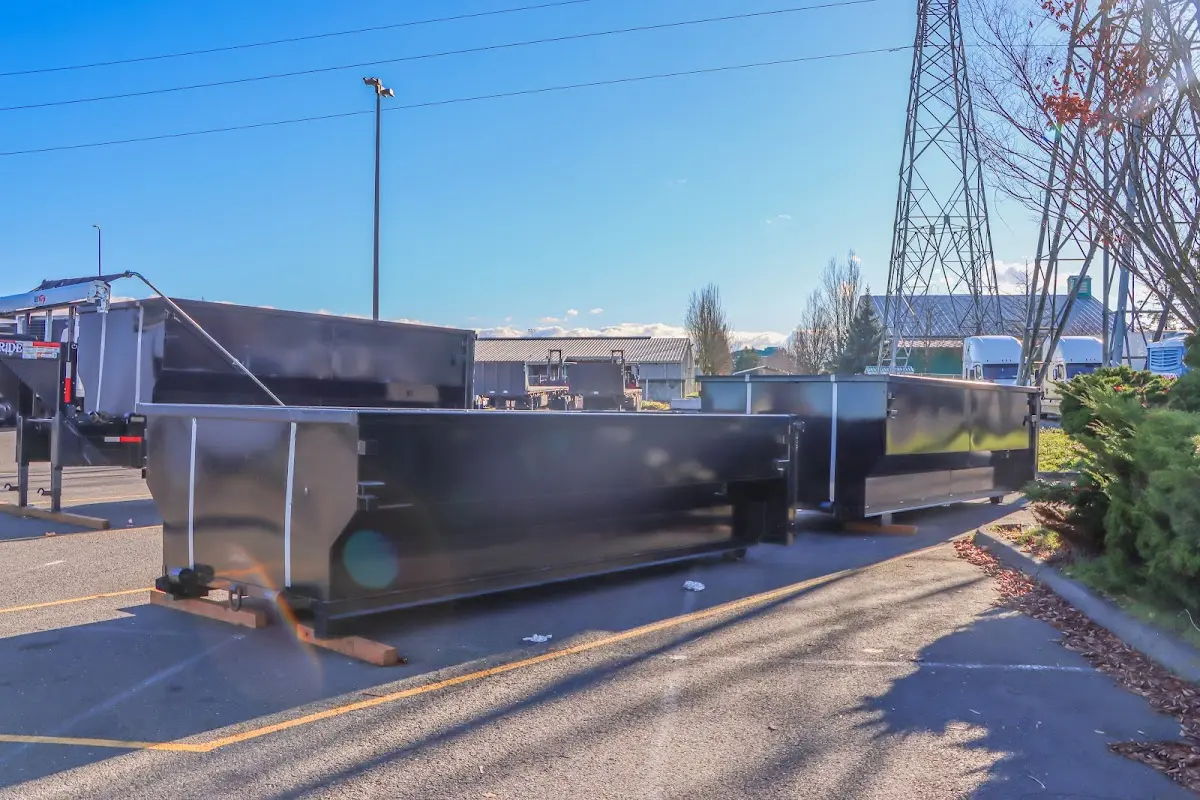 Roll-off dumpster ready for waste disposal at job site for Construction Dumpster Rental in Owatonna